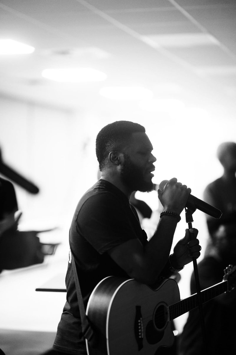 Guitarist playing and singing